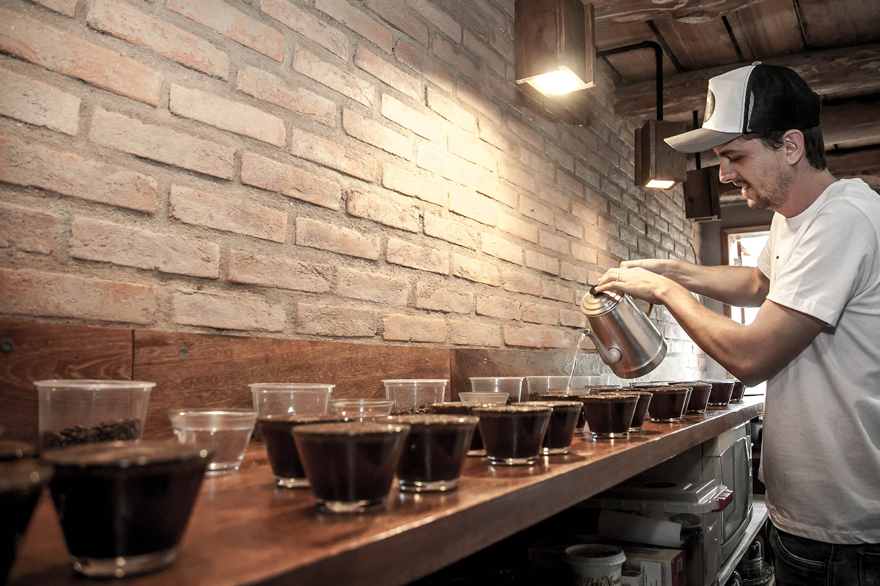 Cupping table being prepared at Santa Rita Farm, Caparaó, Brazil